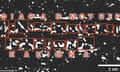 White marks on black background with red graphic showing corresponding Greek letter