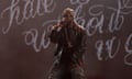 Kendrick Lamar performing on stage for the Grand National tour