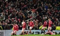 Manchester United’s Harry Maguire celebrates with his teammates after his side’s comeback win in the Europa League quarter-final against Lyon