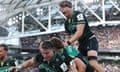 Henry Pollock jumps on his Northampton teammates at the final whistle