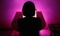 A silhouette of a woman playing a game
